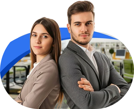 A professional man and woman are standing back to back with arms crossed, both dressed in business attire.